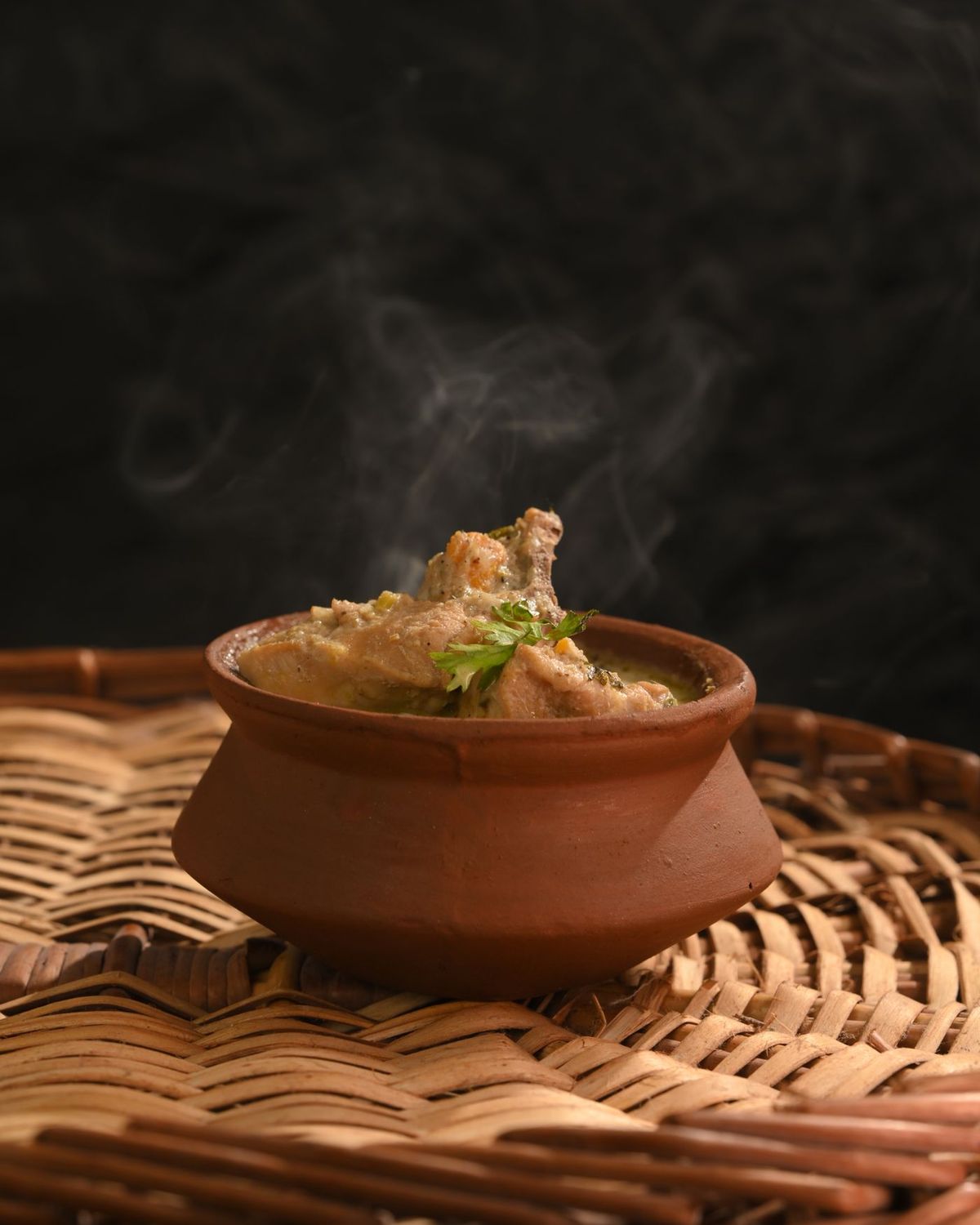Chicken curry in a clay pot